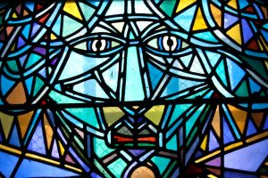Stained glass face. Photo by Marie Bellando Mitjans.