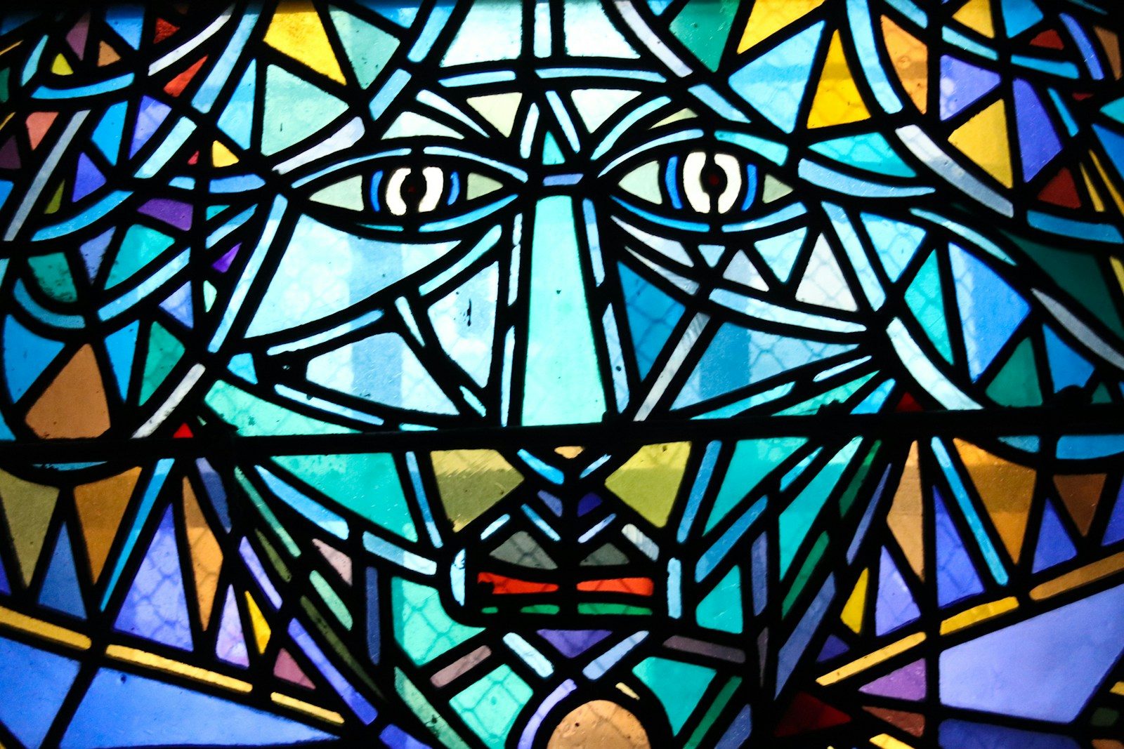 Stained glass face. Photo by Marie Bellando Mitjans.